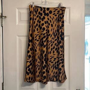 J.crew Midi silky skirt. Cute with tall boots or booties. Fun with a sneakers.